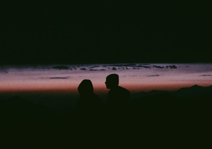 silhouette photo of man and woman