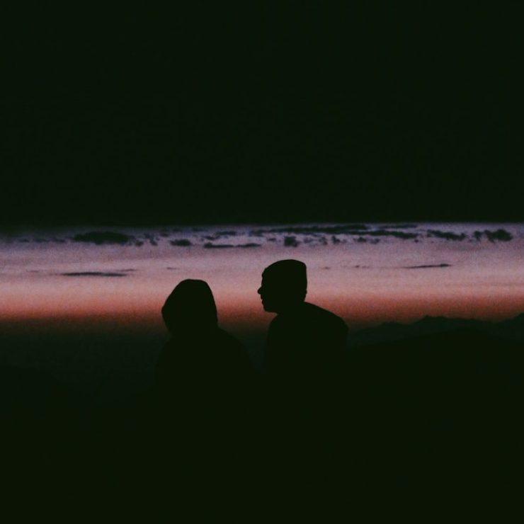 silhouette photo of man and woman