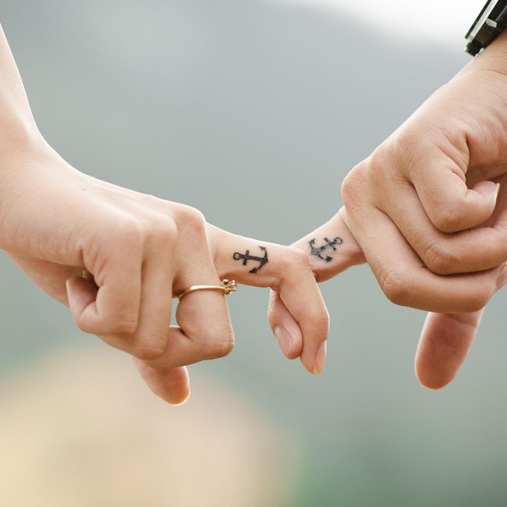 valentines day background, couple, hands, tattoos, fingers, intertwined, anchor tattoos, lovers, together, touch, relationship, closeup